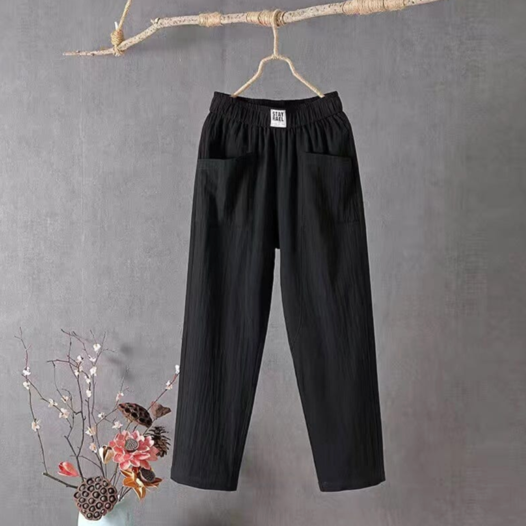 Breathable women's linen trousers with elastic waist. Effortless style, perfect for casual summer outings & comfort.