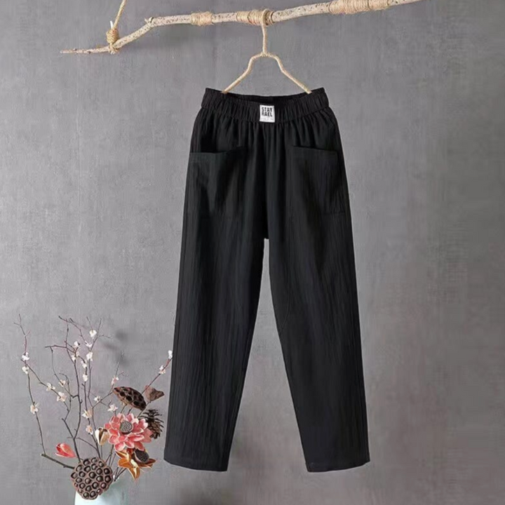 Breathable women's linen trousers with elastic waist. Effortless style, perfect for casual summer outings & comfort.