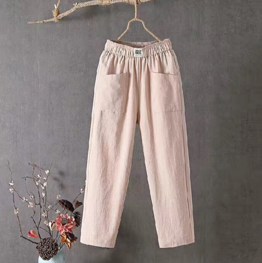 Lightweight women's linen trousers, elastic waist. Enjoy breathable comfort & casual versatility for summer fashion.