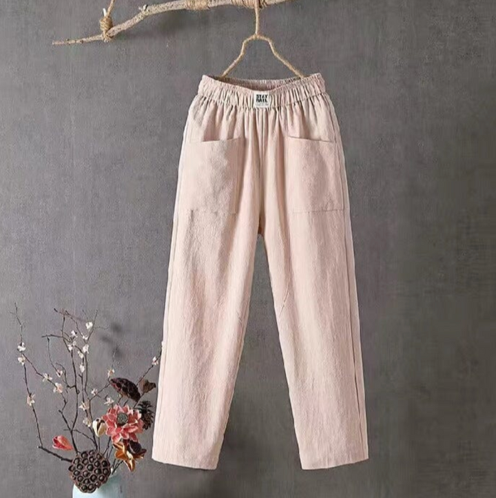 Lightweight women's linen trousers, elastic waist. Enjoy breathable comfort & casual versatility for summer fashion.