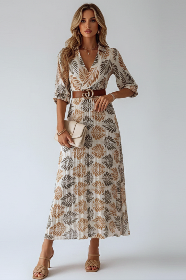 Elegant patterned long dress for women, featuring comfortable elbow sleeves. Ideal for spring & summer casual wear.