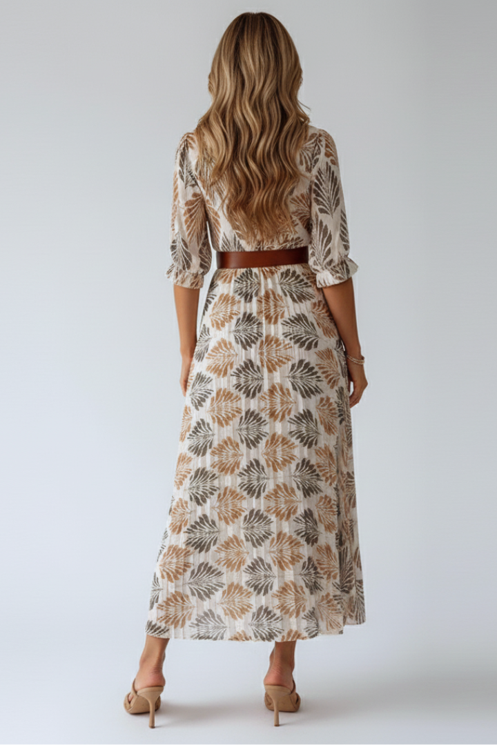 Flowy patterned maxi dress for women, featuring elbow sleeves. A comfortable, elegant long dress for summer & spring.