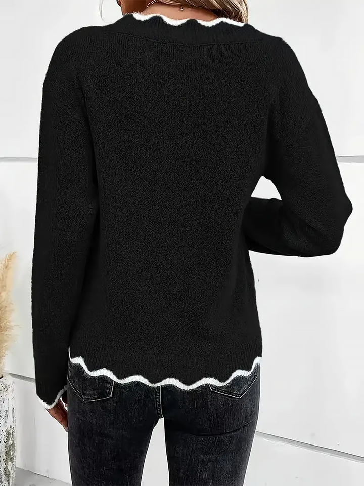 Modern women's pullover sweatshirt with a stylish notch V neck and long sleeves.