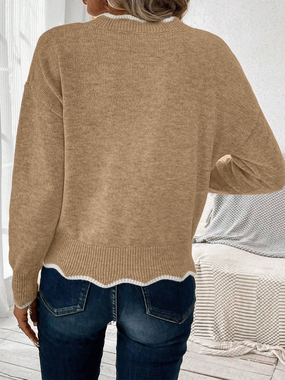 Relaxed women's pullover with a notch V neck, perfect for casual comfort.