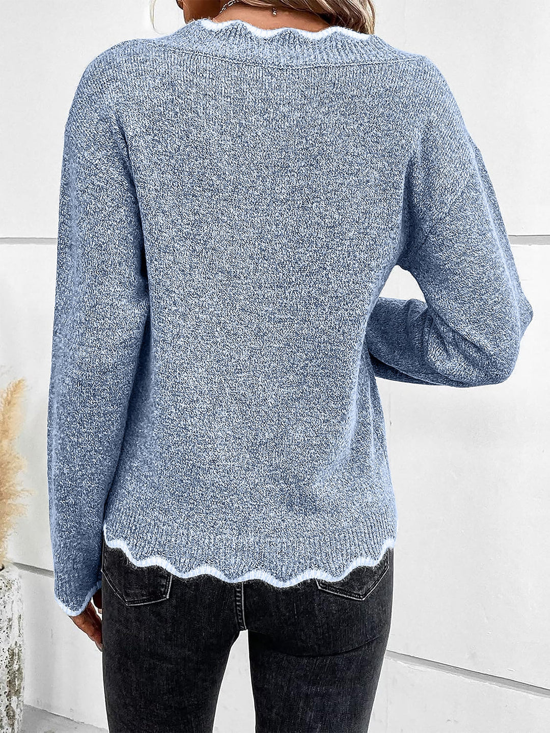 Cozy women's notch V neck long sleeve pullover sweatshirt with a relaxed fit.