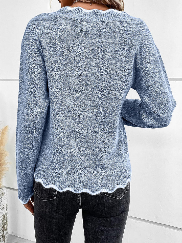 Cozy women's notch V neck long sleeve pullover sweatshirt with a relaxed fit.