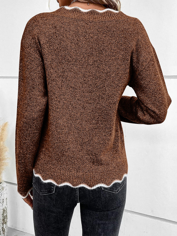 Relaxed fit women's notch V neck pullover for comfortable everyday style.