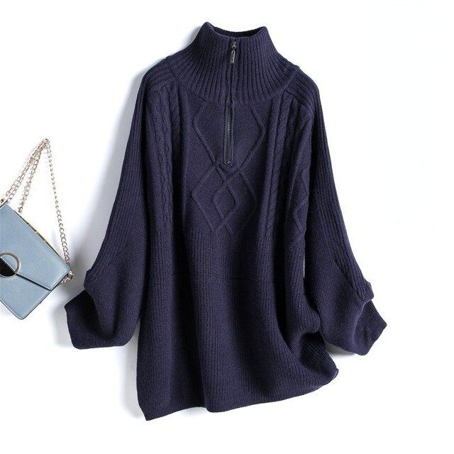 Cozy & chic women's oversized knit sweater, a relaxed fit long sleeve top for comfortable fall & winter fashion.