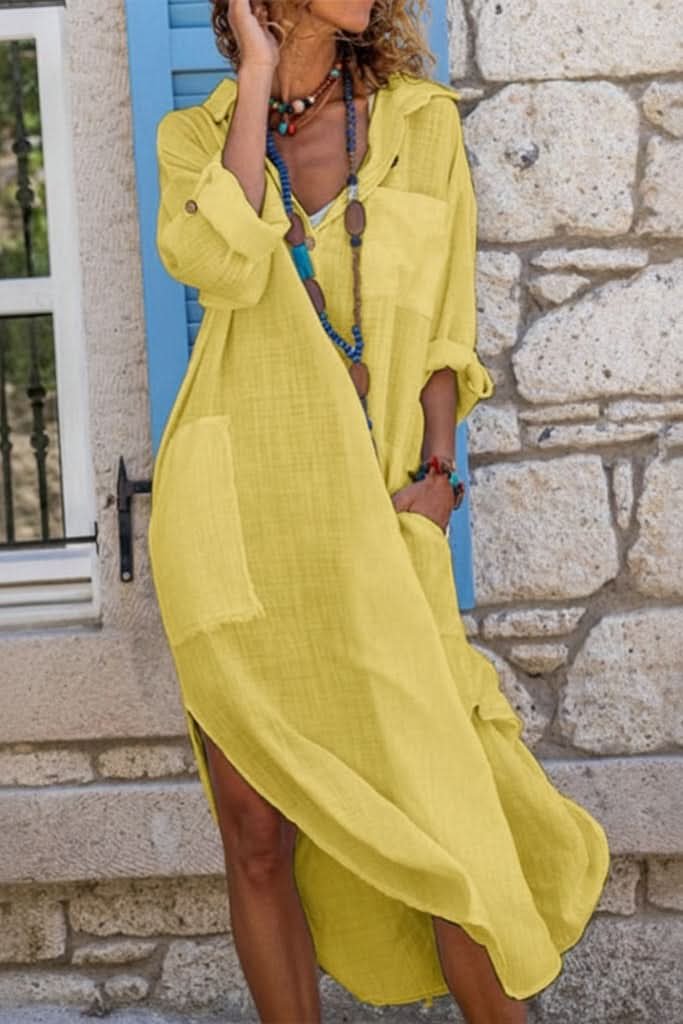 Close-up of the breathable fabric of a women's boho oversized midi shirt dress, showing flow and texture.