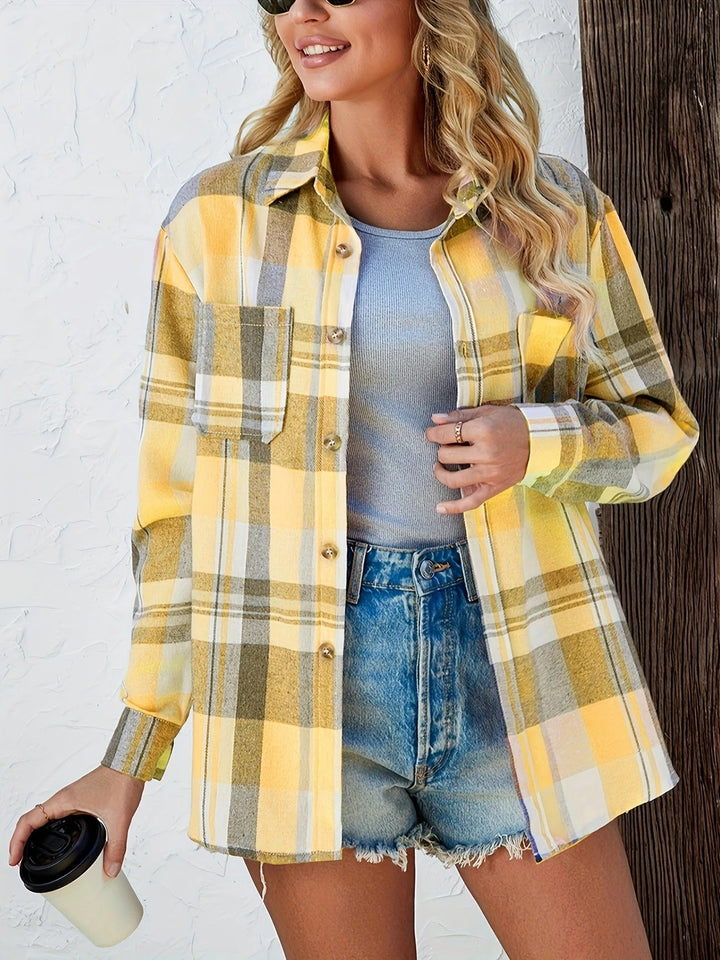 Trendy women's plaid shirt with button-down front, long sleeves, and a comfortable, versatile design.