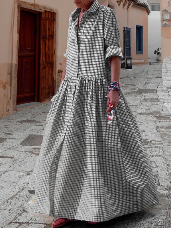 Women's effortless plaid swing dress with long sleeves, perfect for casual fall & spring outfits.