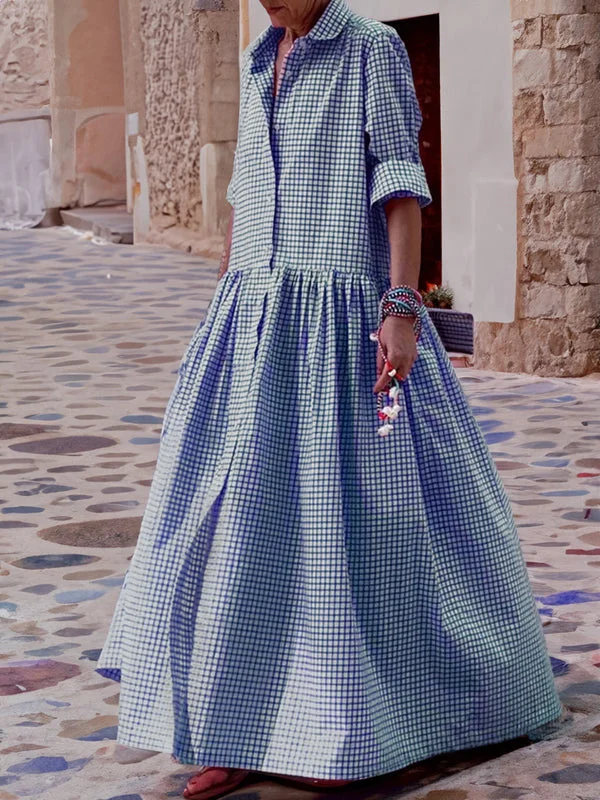 Comfortable women's long sleeve plaid midi swing dress, ideal for versatile everyday wear.