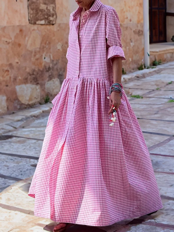 Everyday wear women's plaid swing dress with long sleeves. A comfortable midi dress with a checked pattern.