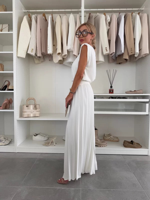 Solid color sleeveless top & wide leg pants two-piece set for women, perfect for relaxed summer fashion.