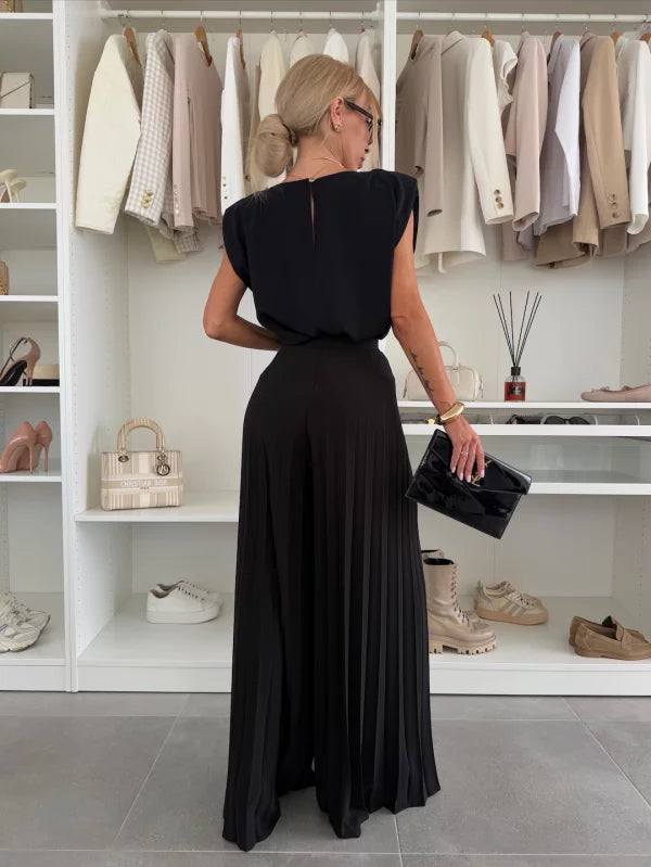 Solid women's sleeveless top and wide leg pants set, a relaxed fit two-piece outfit for summer casual wear.