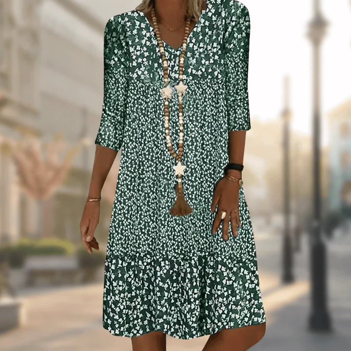 Women's Effortless Soleil summer dress, knee-length, elegant & comfortable for daytime or evening wear. Versatile style.