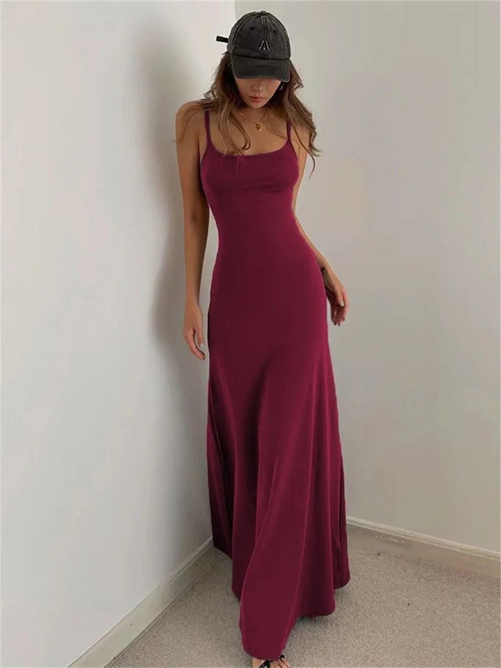 Elegant yet casual women's summer dress featuring spaghetti straps, an airy fit, and a comfortable, flowy design.