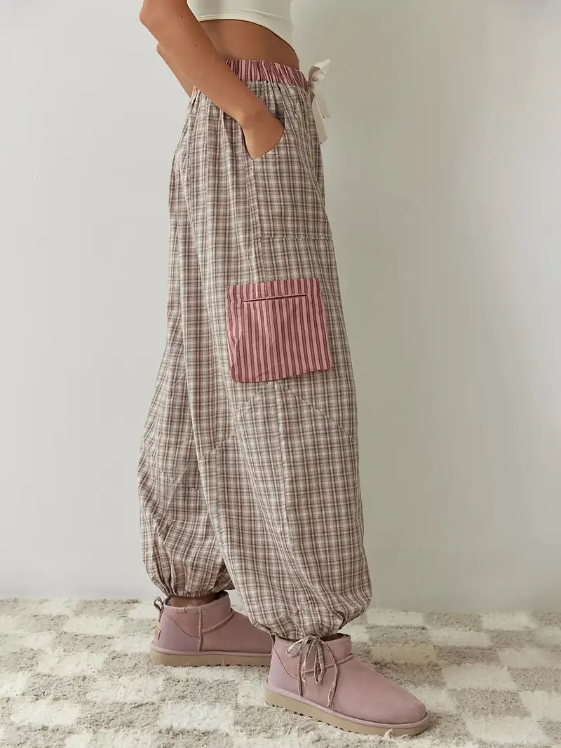Women's striped two-piece lounge set for comfy spring/summer casual wear.