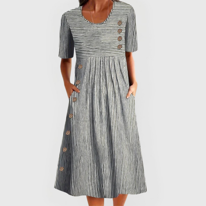 Comfortable women's striped midi dress featuring 3/4 sleeves, ideal for versatile everyday effortless style.