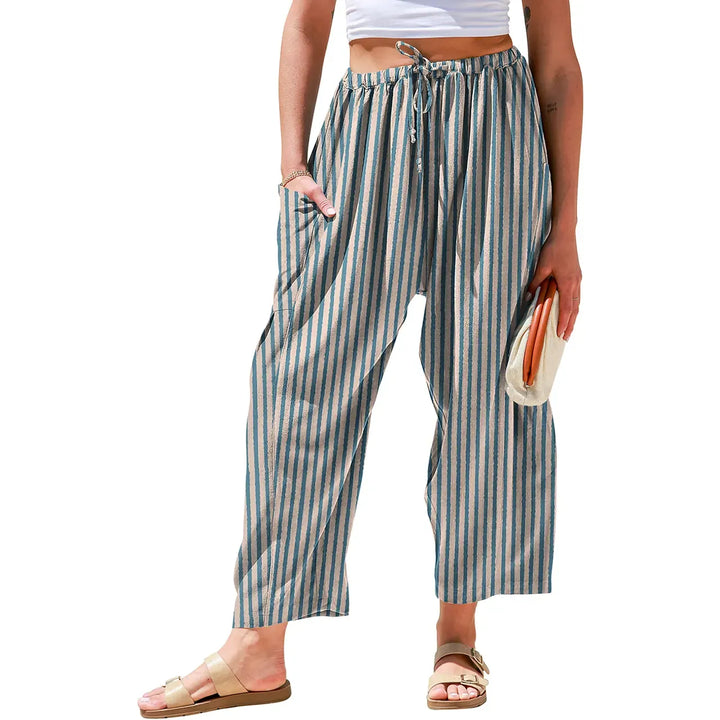 Stylish women's wide-leg striped pants, comfortable and elegant, ideal for spring, summer & resort wear.