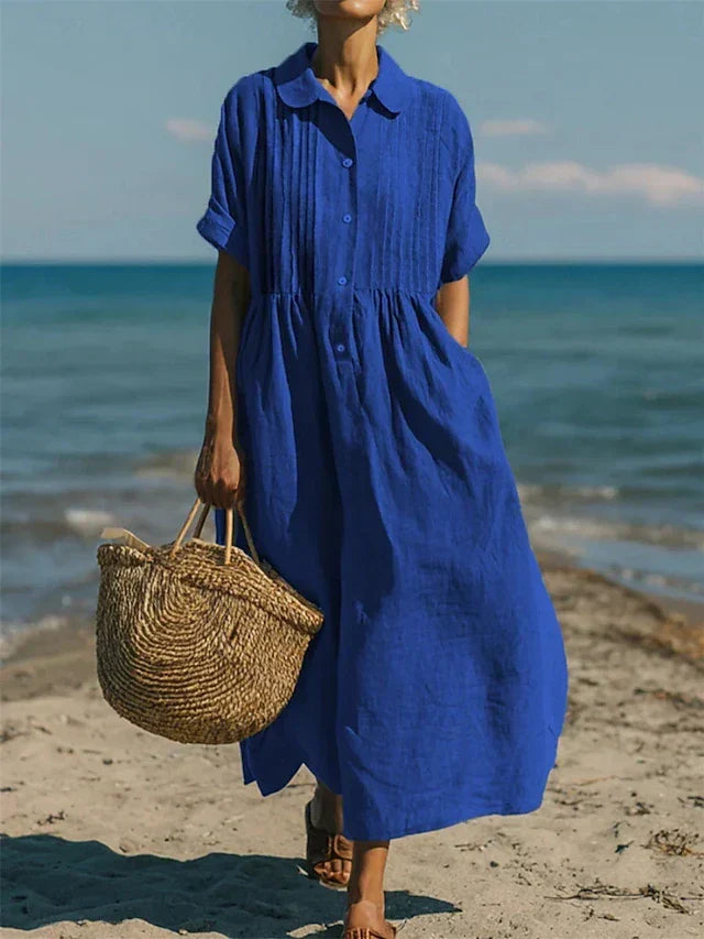 Stylish women's button-down shirt dress, a comfortable and versatile midi perfect for everyday wear.