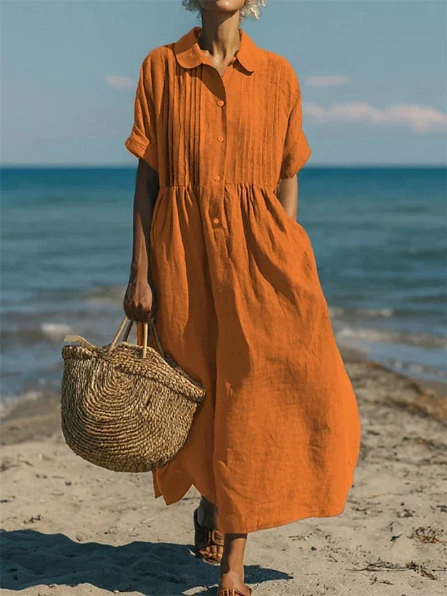 Effortless women's shirt dress, a versatile button-down midi for comfortable and stylish everyday wear.