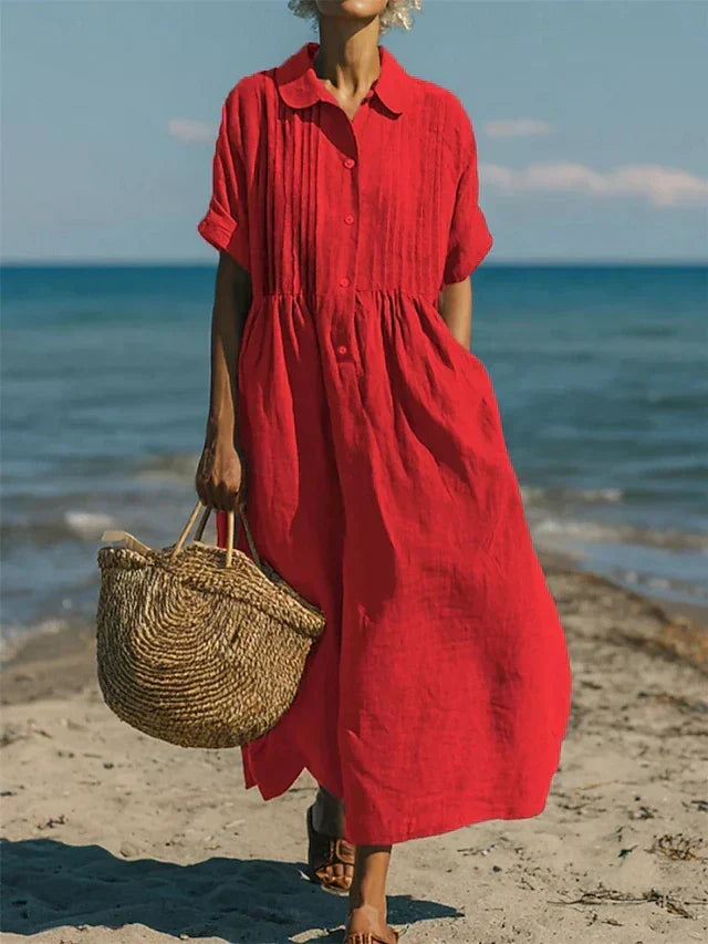 Elegant women's button-down shirt dress, a flowy midi perfect as a comfortable summer casual dress.