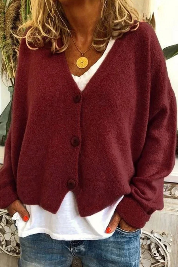 Soft knit women's button-front cardigan. Relaxed fit, perfect for layering & casual wear.
