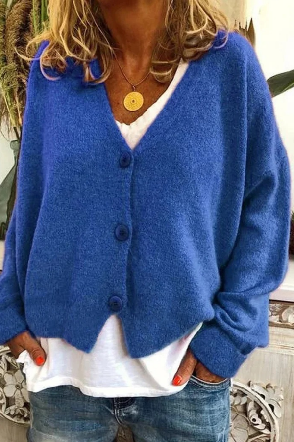Soft women's button-front cardigan, perfect for cozy layering. Casual wear & office chic.