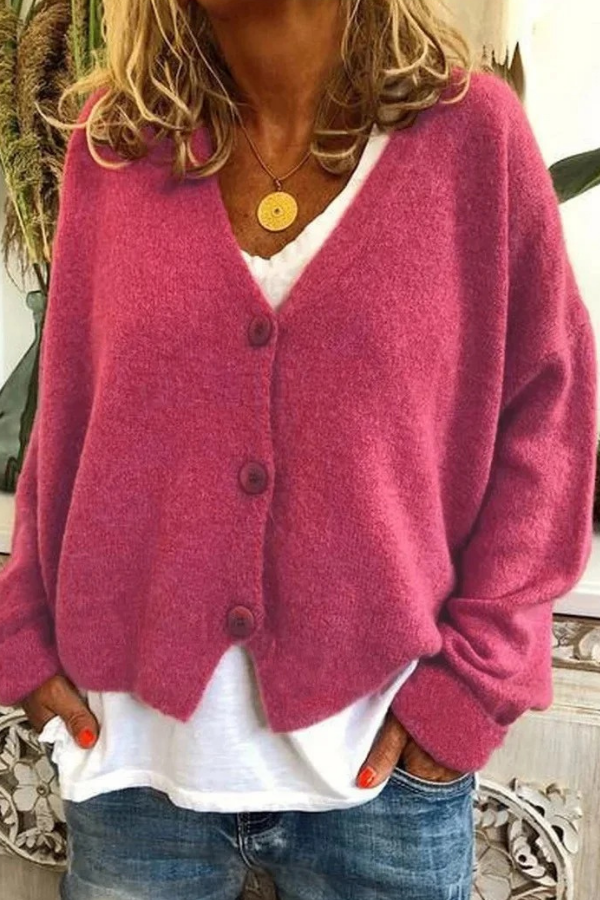 Chic women's button-front sweater, a cozy layering piece. Office ready or casual wear.