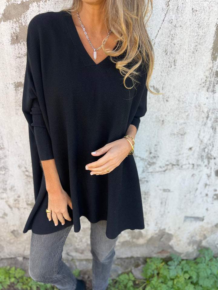 Women's Effortless Swing V-Neck Tunic Pullover. Relaxed fit long sleeve top, ideal for fall & winter fashion.