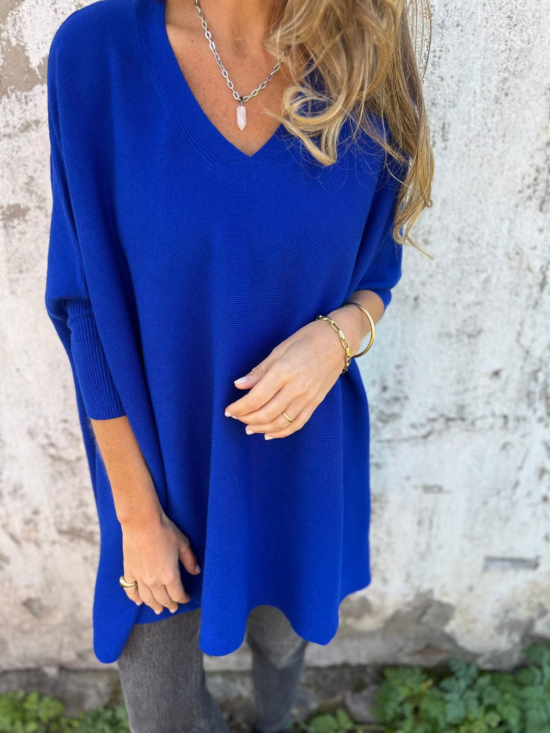 Relaxed fit women's V-neck tunic pullover. Long sleeve swing top, great for casual wear & versatile styling.