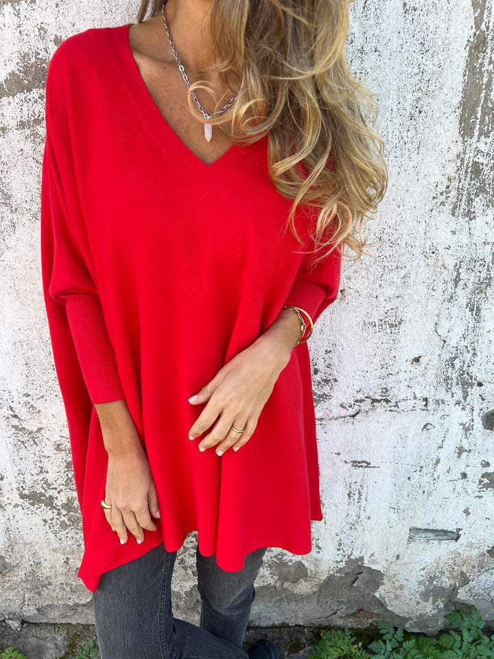 Comfortable women's V-neck tunic pullover. Relaxed fit long sleeve swing jumper, perfect for daily casual style.