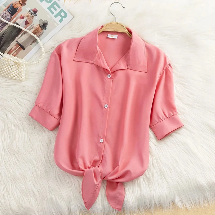 Chic women's tie-front cropped blouse with short sleeves, ideal for spring workwear or fashion top.