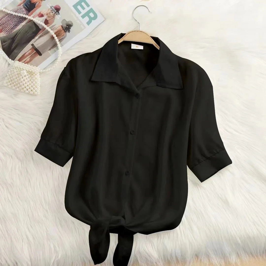 Versatile women's cropped top with a stylish tie-front, great for spring/summer fashion and casual wear.