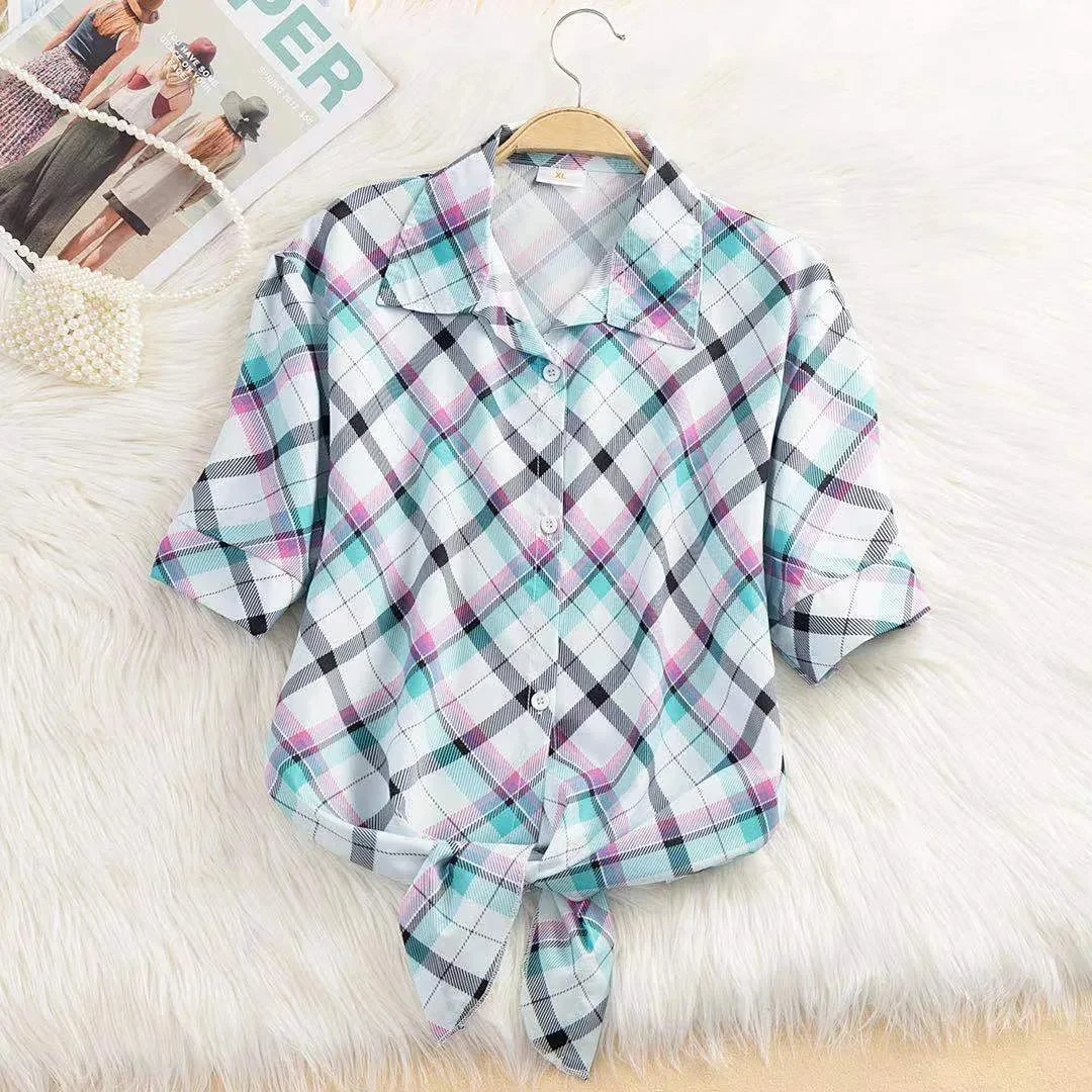 Effortless fashion top: women's cropped blouse featuring a trendy tie-front design for versatile spring style.