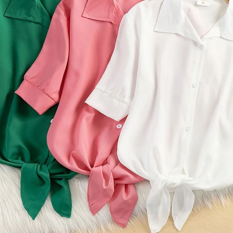 Stylish women's cropped tie-front blouse, short sleeve & versatile for summer fashion, casual elegance, or workwear.