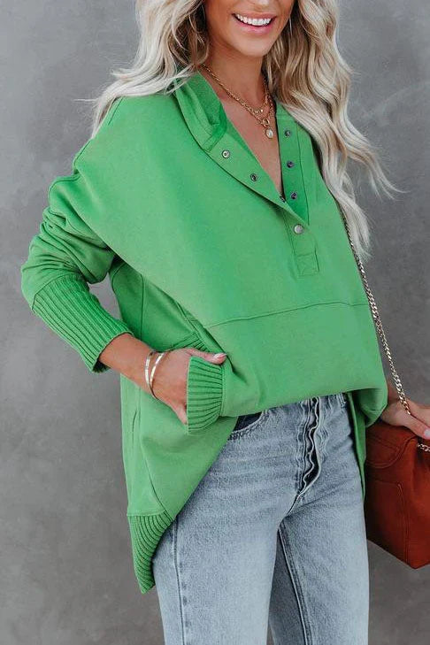 Women's casual long sleeve pullover tunic hoodie with a comfortable relaxed fit and drawstring.
