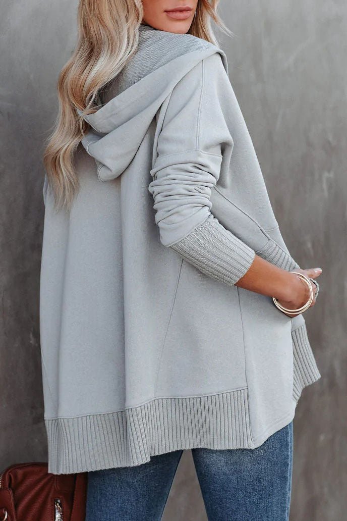 Close-up of the drawstring hood & snap neckline on a women's effortless tunic sweatshirt.