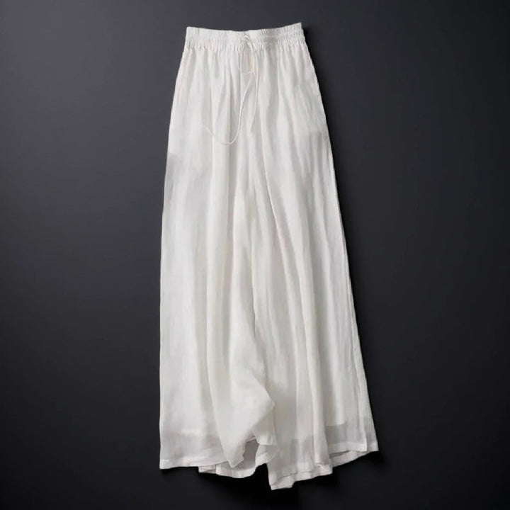 Women's effortless wide-leg summer pants in a breezy, relaxed fit with a drawstring waist, perfect for vacation.