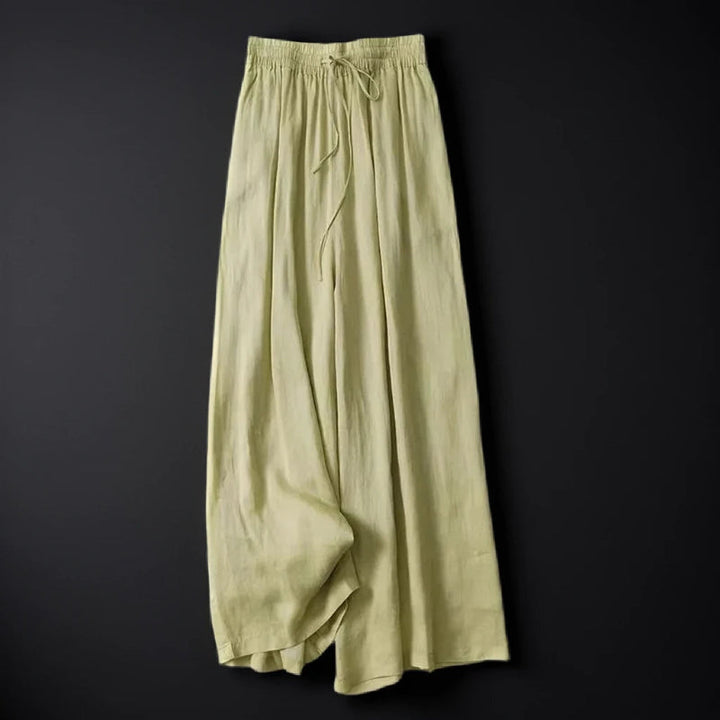 Relaxed fit women's wide-leg pants with a drawstring, ideal for casual summer days or a comfortable holiday.