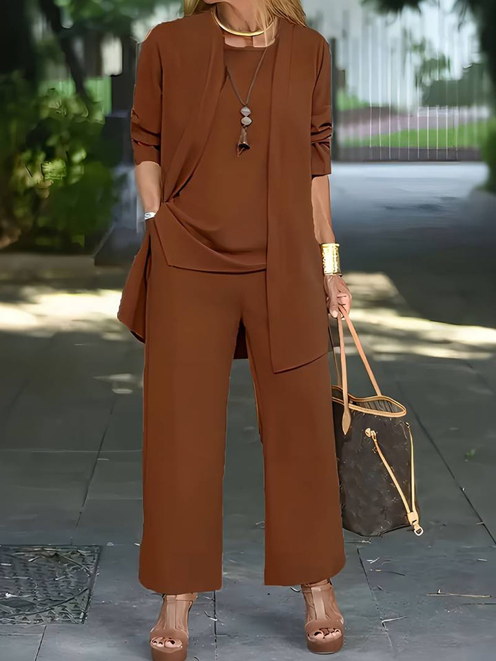Elegant women's wide-leg trouser, tunic & cardigan 3-piece ensemble. Coordinated set for effortless spring fashion.