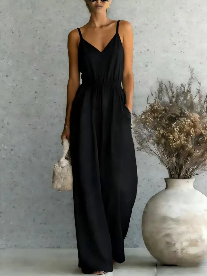 Stylish women's sleeveless wide leg jumpsuit with V-neck, ideal for chic casual outfits & vacation wear.