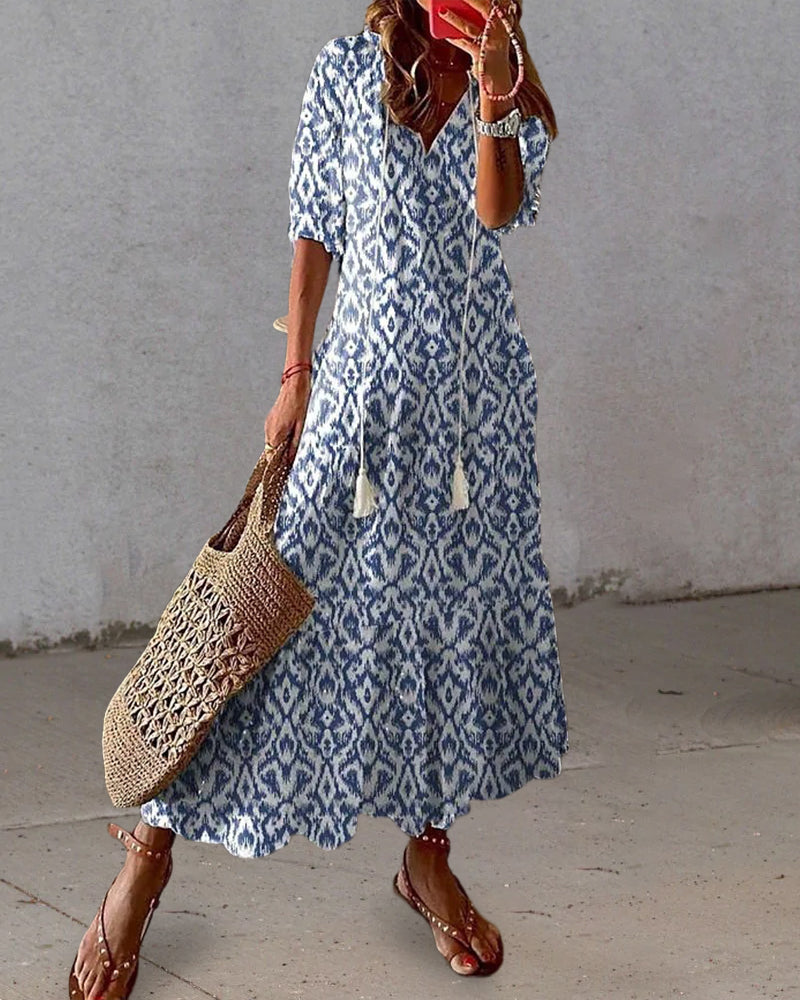 Stylish Elara V-neck A-line maxi dress for women, offering a comfortable, flowy fit for casual summer days.