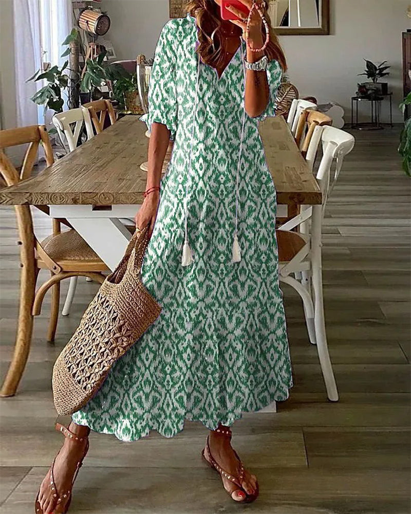 Elegant women's Elara maxi dress, ideal for summer fashion & vacation wear. Features a beautiful, comfortable design.