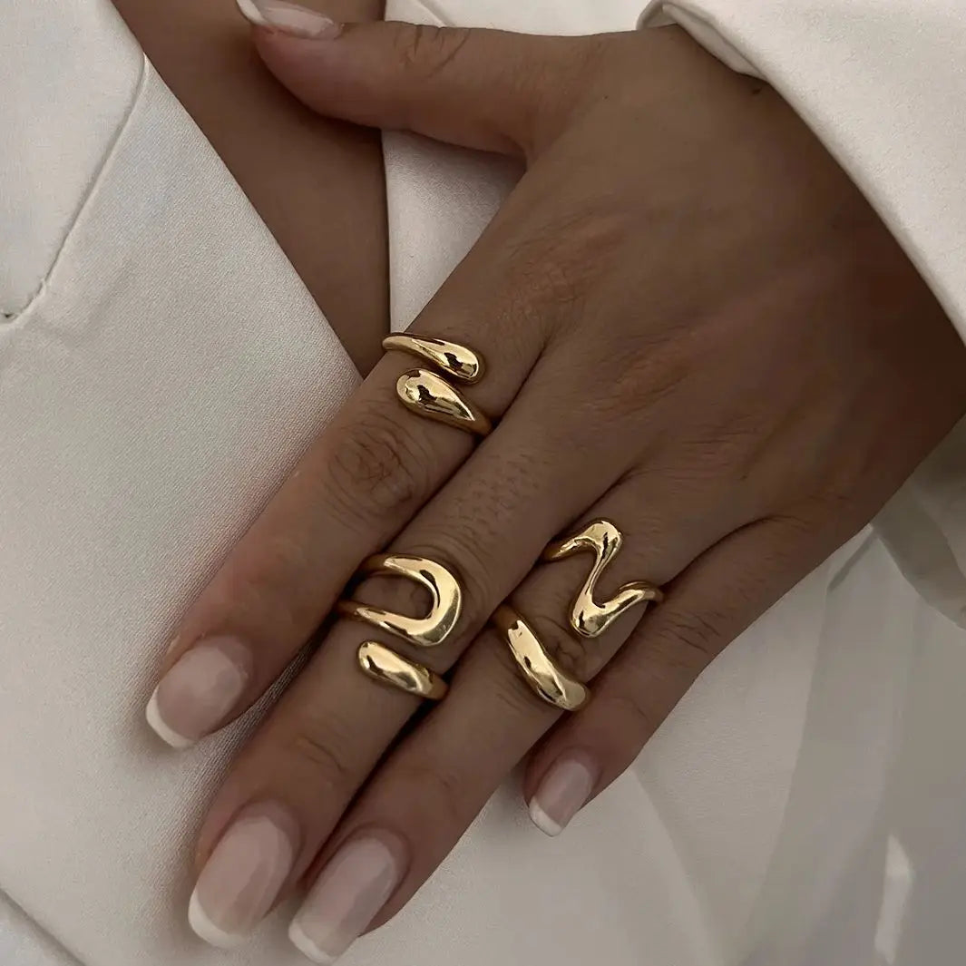 Women's Elavon Fluid Metal Ring Set, sculptural design, elegant modern jewelry.