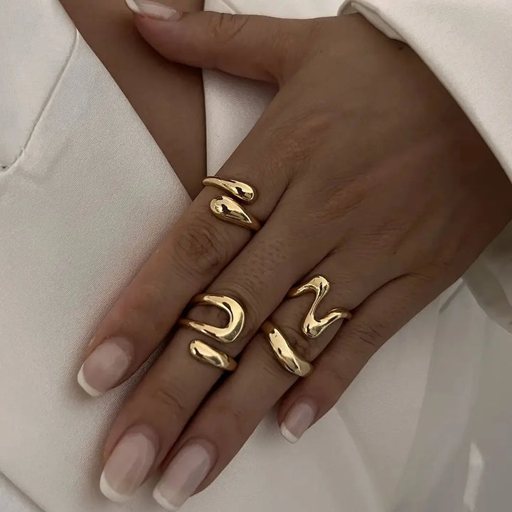 Women's Elavon Fluid Metal Ring Set, sculptural design, elegant modern jewelry.