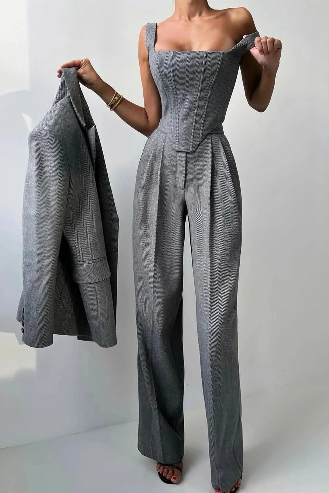 Formal wear women's 3-piece power suit with a corset bustier, wide leg pants & chic blazer.