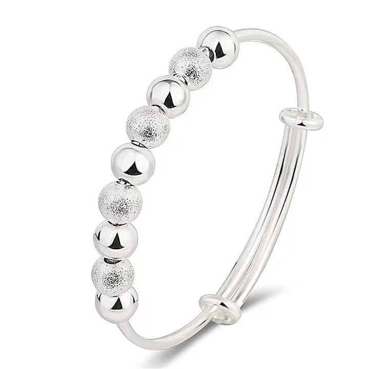Delicate women's silver party bracelet featuring a luxurious charm, an elegant accessory for any event.