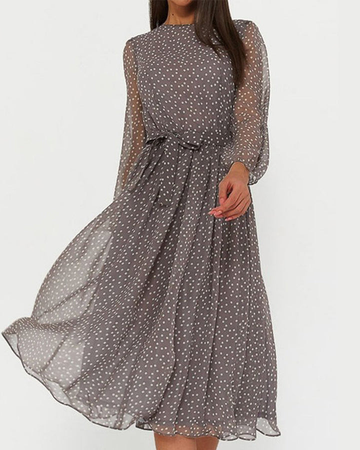 Women's elegant A-line polka dot dress with stylish lantern sleeves, perfect for spring and summer everyday wear.